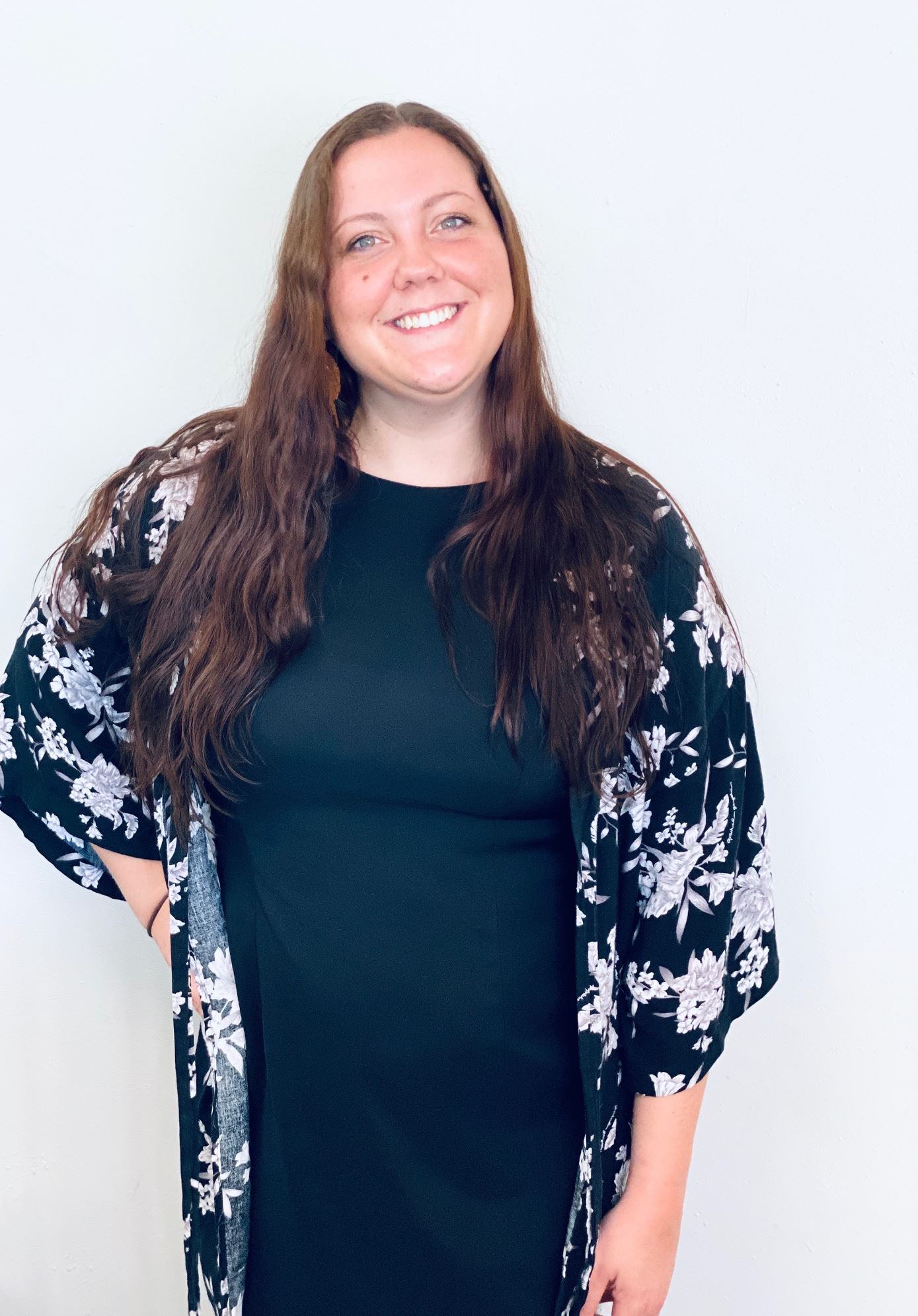 Bridal stylist Kaitlyn wearing a floral kimono and a black blouse